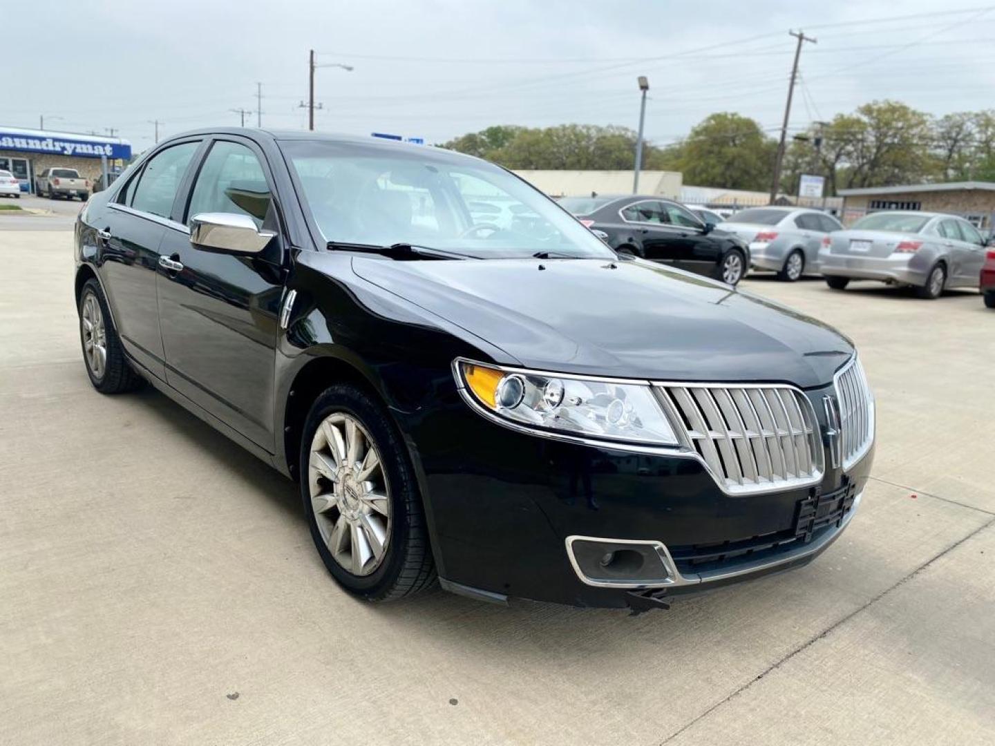 2011 BLACK LINCOLN MKZ (3LNHL2JC6BR) with an 3.5L engine, Automatic transmission, located at 4415 NE 28th St., Haltom City, TX, 76117, (817) 222-9334, 0.000000, 0.000000 - Photo#1